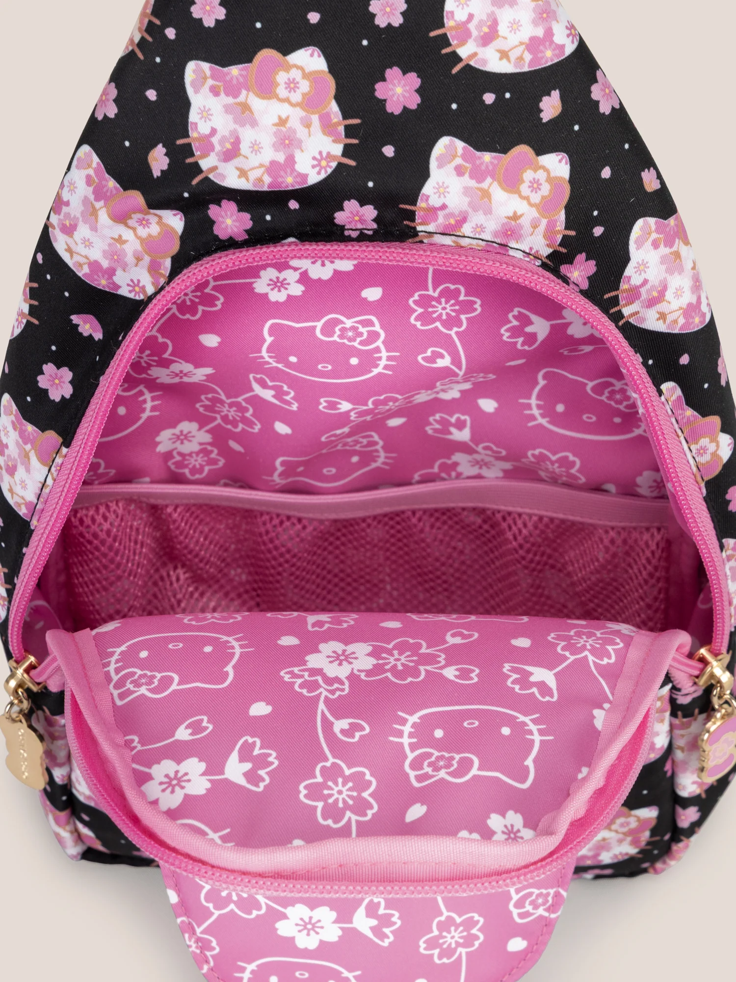 Hello Kitty® × JuJuBe Cherry Blossoms Crossbody Sling Diaper Bag — Black and Pink - Image 6